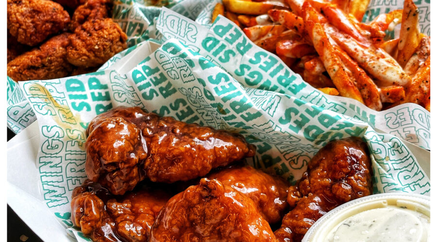 Wingstop UK Celebrates Milestone with 50th Store Opening Amid Expansion Plans